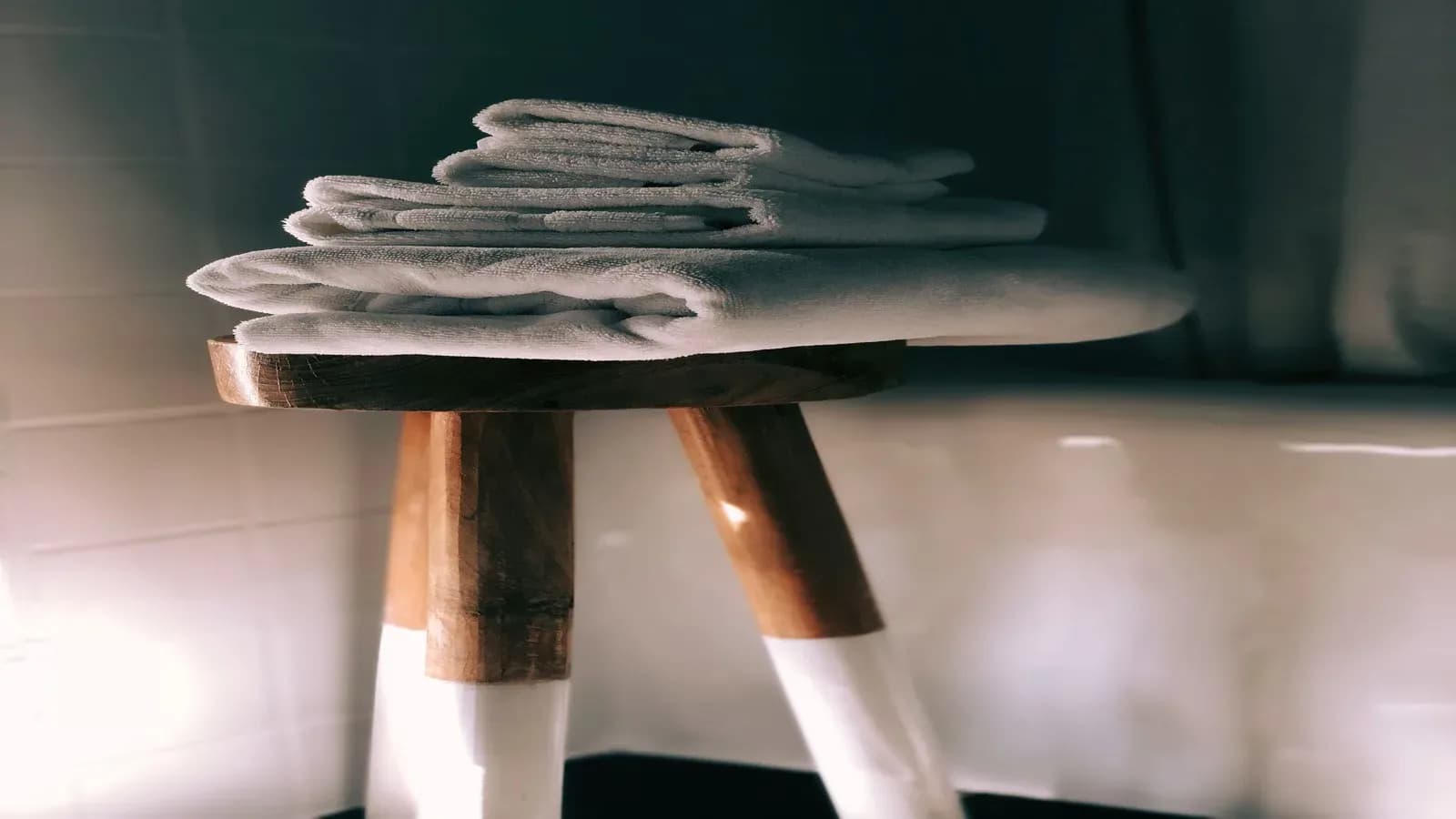 Hotel-grade cleaning detail with fresh folded towels