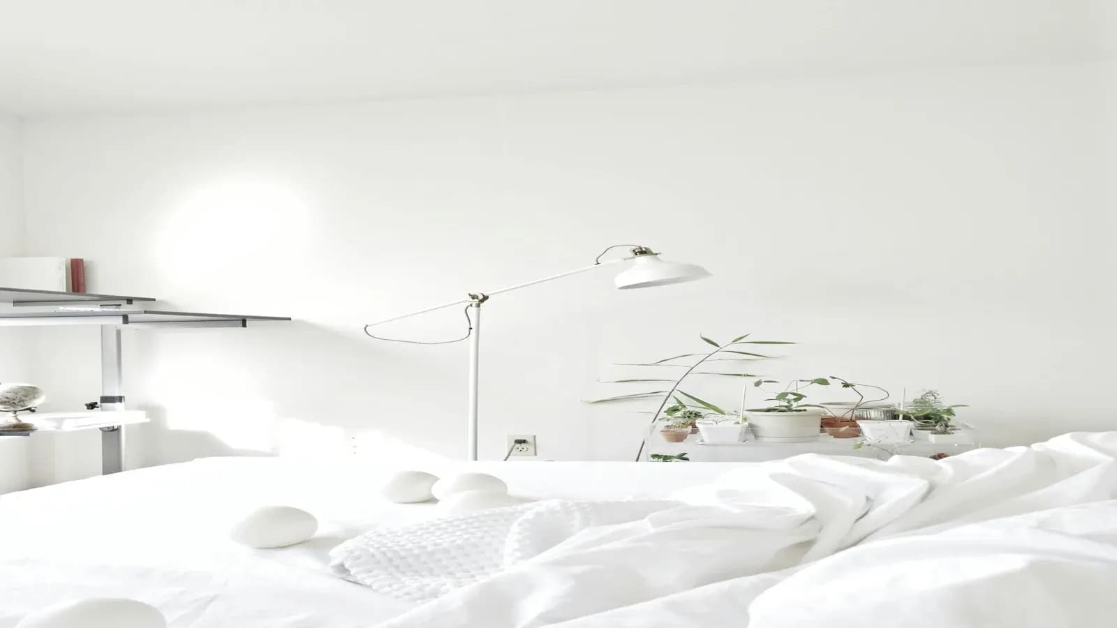 Beautifully printed welcome card on bedside table with warm lighting